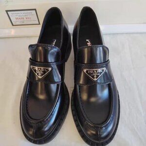 Prada Women's Glossy Black Slip-On Loafers